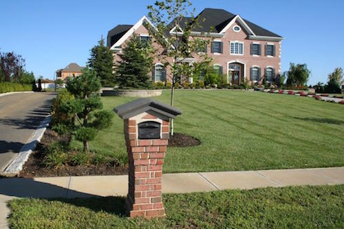 white brick pillar mailox