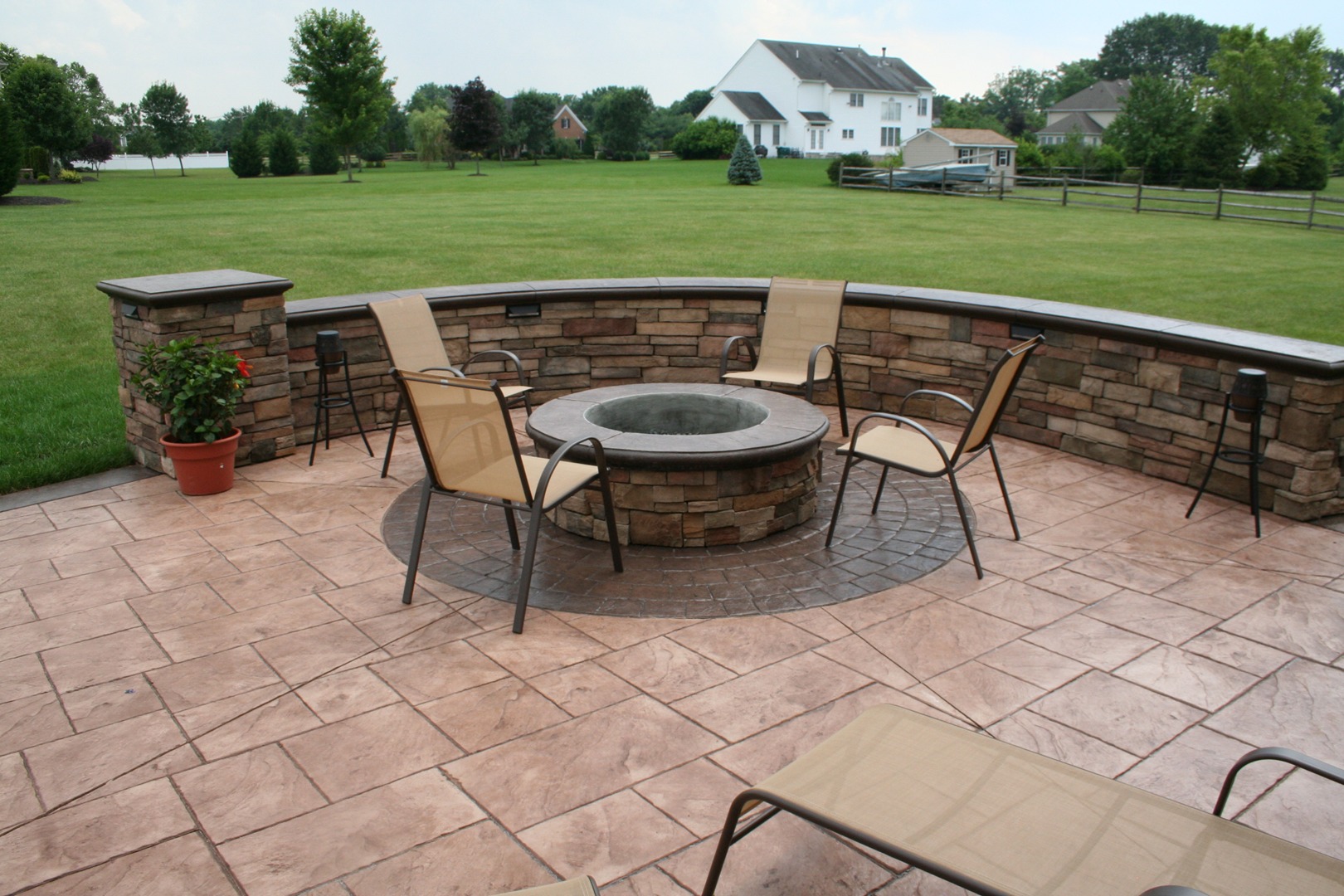 custom fire pit and matching seating wall installed in Cream Ridge, NJ